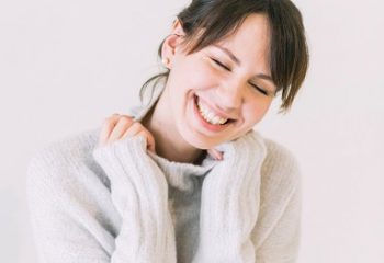 woman-wearing-white-turtle-neck-sweater