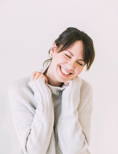 woman-wearing-white-turtle-neck-sweater